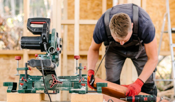 Contractor doing A well-built house or commercial building can have its quality credited to two primary factors, the foundation and the framing.