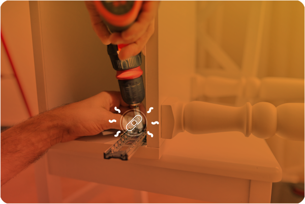 Worker adjusting a cabinet with confidence because he can count on contractor liability insurance