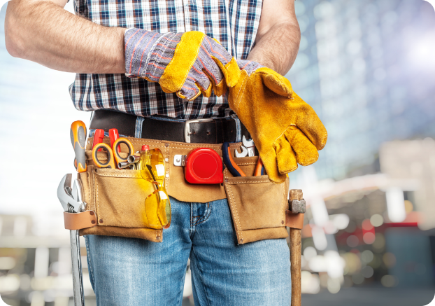Image of a contractor putting on gloves before work