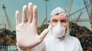 health care worker in protective suit