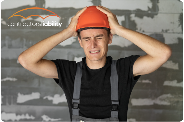 man holding his helmet for the confidence of having Constractor Liability